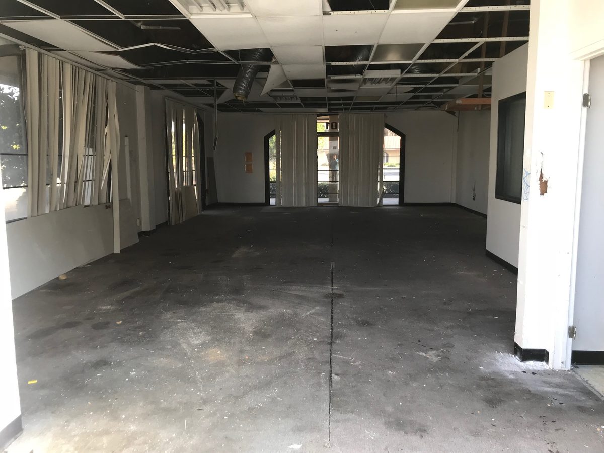 Commercial suite after cleaning: clear, broom-clean space