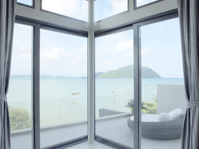 Floor-to-ceiling windows with ocean view, streak free